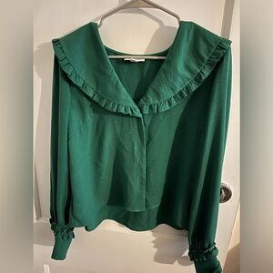Topshop evergreen color blouse with ruffle at collar and wrists, size US 10
